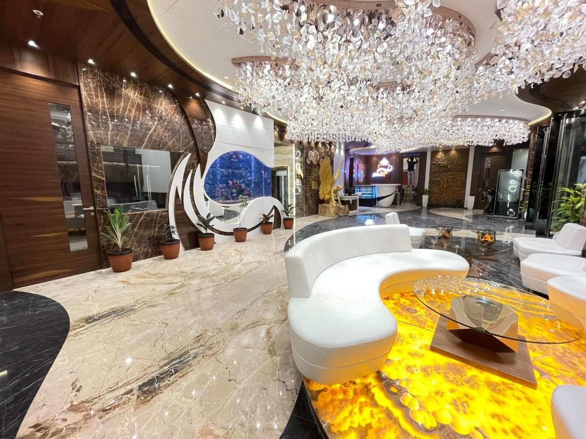 Circular feature aquarium designed for an interior space in Chennai